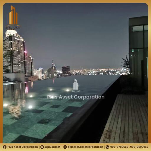 Luxurious rooftop pool with city skyline view at night