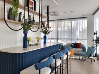 Modern living room with breakfast bar and elegant seating area