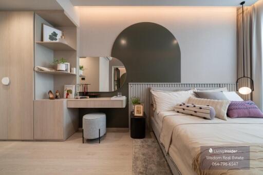 Modern bedroom with integrated study area and stylish interior design