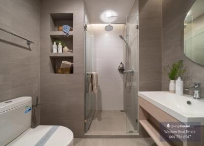 Modern bathroom with walk-in shower and elegant finishes