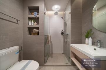 Modern bathroom with walk-in shower and elegant finishes