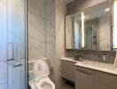Modern bathroom with spacious shower and elegant vanity