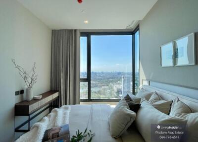 Modern living room with cityscape view through large window