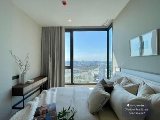 Modern living room with cityscape view through large window