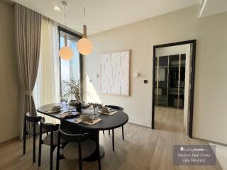 Modern dining room with natural light and stylish decor