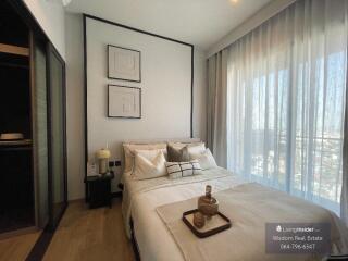 Modern bedroom with neutral color palette and natural light