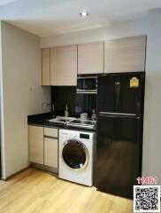 Compact modern kitchen with integrated appliances