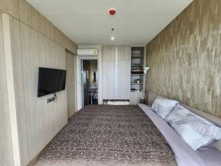 Modern bedroom with neutral tones and elegant design