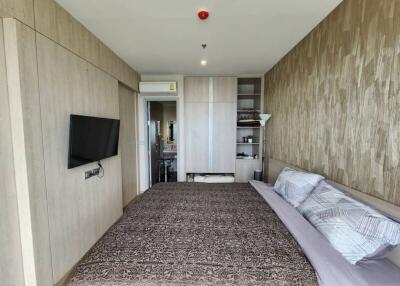 Modern bedroom with neutral tones and elegant design
