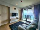 Cozy living room with ocean view, comfortable sofa, and modern amenities