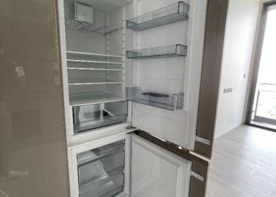 Open modern built-in refrigerator in a kitchen