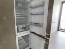 Open modern built-in refrigerator in a kitchen