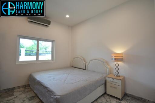 Modern and bright bedroom with air conditioning