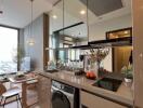 Modern kitchen with integrated appliances and city view