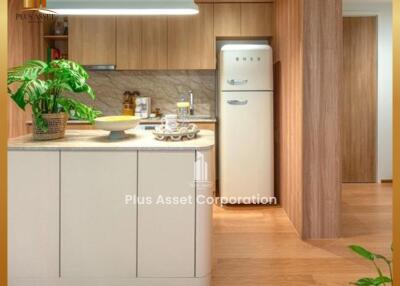 Modern kitchen with wooden accents and built-in appliances