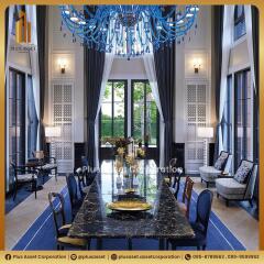 Elegant dining room with blue chandelier and large windows