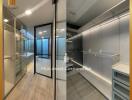 Modern kitchen with integrated cabinets and glass partition