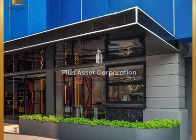 Modern corporate building exterior of Plus Asset Corporation with elegant design