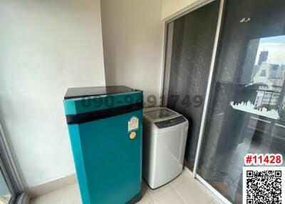 Compact utility area with washing machine and refrigerator
