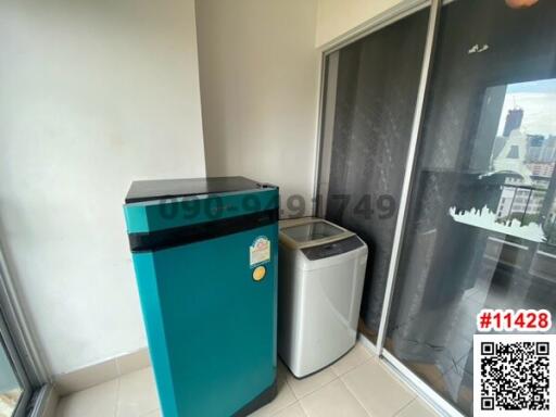 Compact utility area with washing machine and refrigerator