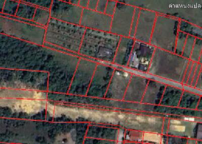 Aerial view of rural real estate parcels with marked boundaries