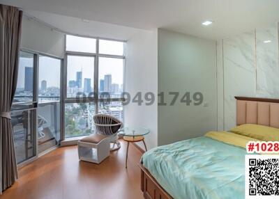 Modern bedroom with city skyline view