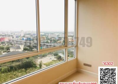 Spacious corner room with large windows overlooking the city