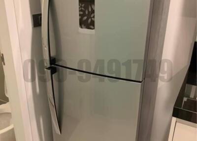 Modern refrigerator in a kitchen setting