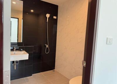 Modern bathroom with walk-in shower and sleek design