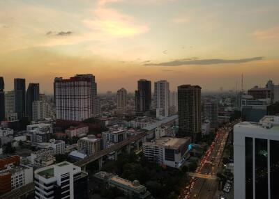 Aerial view of a city at sunset