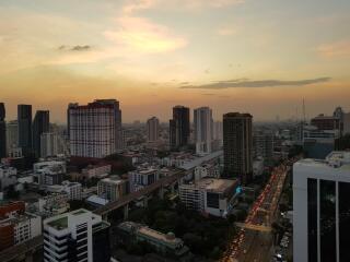 Aerial view of a city at sunset