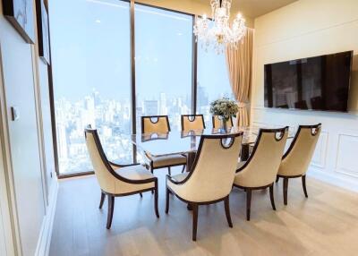Elegant dining room with city view and modern decor