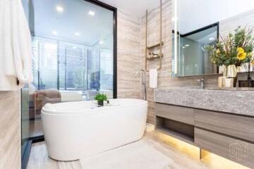 Modern bathroom with freestanding bathtub and contemporary design