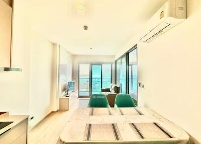 Bright and modern living room with balcony access