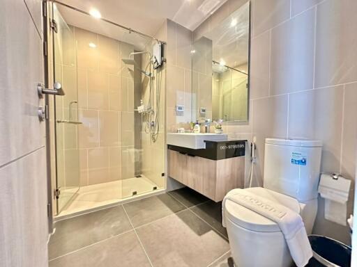 Modern bathroom with glass shower and spacious vanity