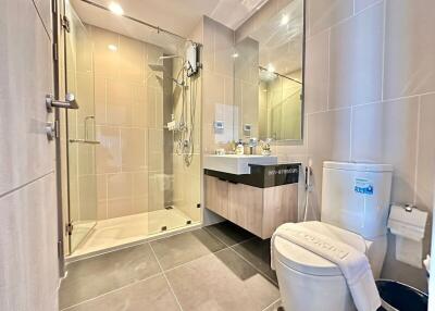 Modern bathroom with glass shower and spacious vanity