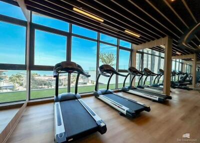 Ocean view gym with modern equipment in a luxury building