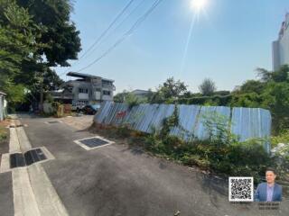 Street view of a real estate outdoor area with surrounding buildings