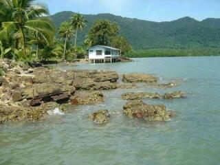 Secluded waterfront house with mountain views