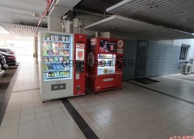 Vending machines in a well-lit parking garage area