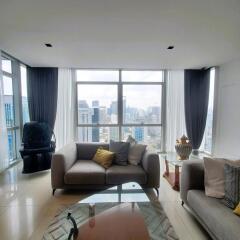 Spacious living room with city skyline view