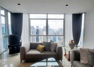 Spacious living room with city skyline view