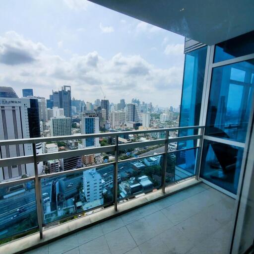 Spacious balcony with panoramic city skyline view