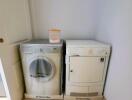 Compact laundry room with modern appliances
