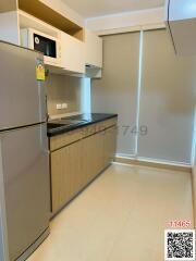 Compact modern kitchen with built-in appliances