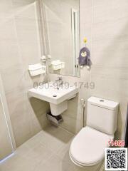 Modern bathroom with white fixtures