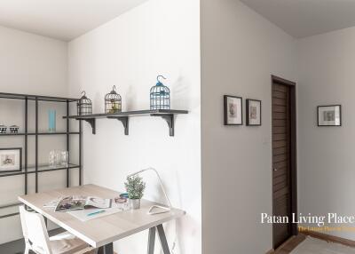 well-lit minimalist study room with decorative elements