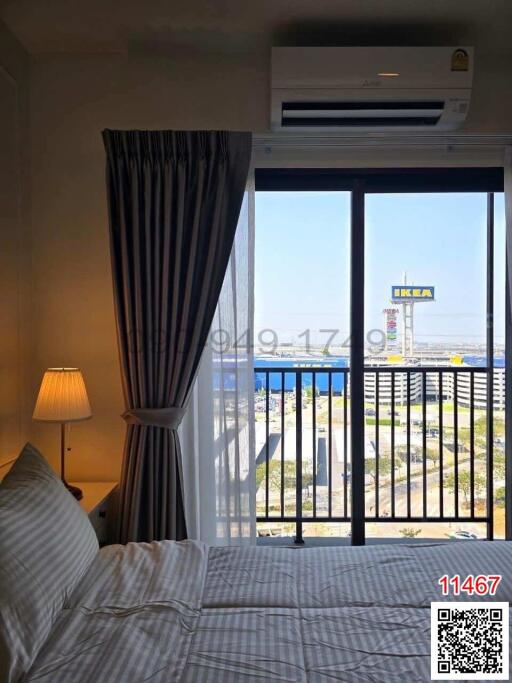 Bright and airy bedroom with ocean view and balcony