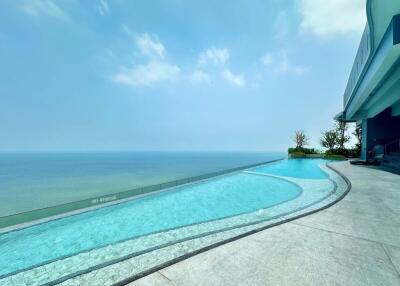 Luxurious outdoor swimming pool with ocean view