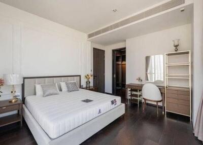 Elegant and well-furnished modern bedroom with ample sunlight